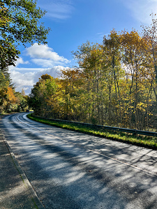 The Winding Autumnal Road in the Scottish Highlands